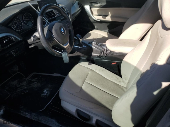 2015 BMW 2 Series 228i with VIN WBA1K5C54FV242897, listed as a Copart auction lot 89165755 with 37,100 mi miles and Salvage Title. Bid and sale history available at carsss.com. Image 7.