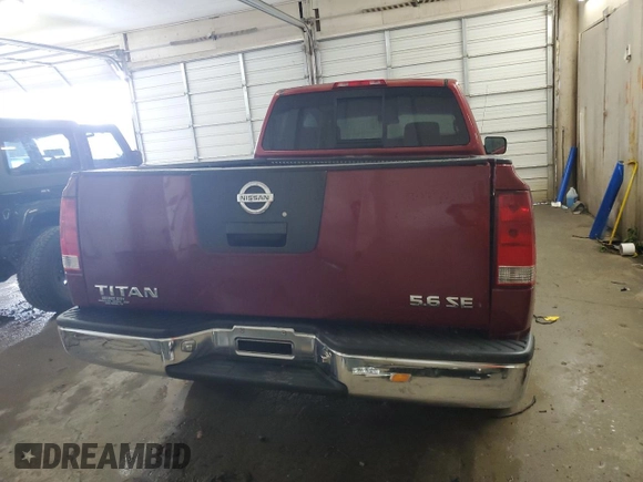 2004 Nissan Titan SE z VIN 1N6AA06A84N590696, wystawiony jako Copart lot #55947145 z przebiegiem 244 851 mil mil oraz Szkoda całkowita • Salvage title. Historia ofert i sprzedaży dostępna na DreamBid. Obrazek 6.