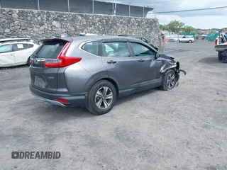 2017 Honda CR-V LX with VIN 2HKRW6H3XHH205122, listed as a IAAI auction lot 41885439 with 50,003 mi miles and . Bid and sale history available at DreamBid. Image 4.