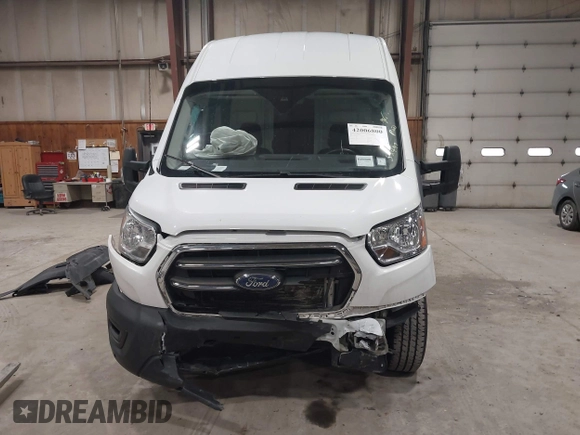 2020 Ford Transit Cargo with VIN 1FTBR3X85LKA65544, listed as a IAAI auction lot 42006800 with 55,497 mi miles and . Bid and sale history available at DreamBid. Image 13.