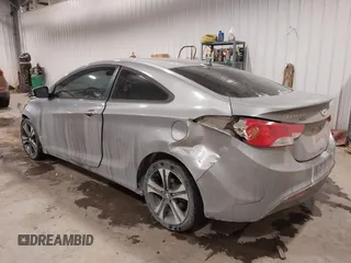 2013 Hyundai Elantra Coupe GS PZEV with VIN KMHDH6AE6DU000893, listed as a IAAI auction lot 41613994 with 94,388 mi miles. Bid and sale history available at carsss.com. Image 3.