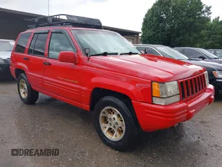 1996 Jeep Grand Cherokee Limited with VIN 1J4GZ78YXTC295872, listed as a IAAI auction lot 42339960 with 265,609 mi miles and . Bid and sale history available at DreamBid. Image 1.