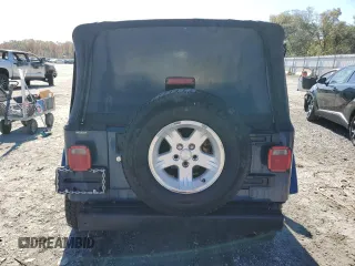 2005 Jeep Wrangler X z VIN 1J4FA39S75P374255, wystawiony jako Copart lot #51298675 z przebiegiem Nie podano mil oraz Szkoda całkowita • Salvage title. Historia ofert i sprzedaży dostępna na DreamBid. Obrazek 6.