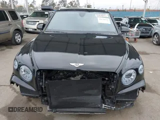 2022 Bentley Bentayga V8 z VIN SJAAM2ZV1NC013849, wystawiony jako IAAI lot #42176939 z przebiegiem 15 292 mil mil oraz . Historia ofert i sprzedaży dostępna na DreamBid. Obrazek 13.
