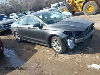 2018 Ford Fusion SE z VIN 3FA6P0HD7JR211569, wystawiony jako IAAI lot #41792146 z przebiegiem 187 505 mil mil oraz . Historia ofert i sprzedaży dostępna na DreamBid. Obrazek 1.