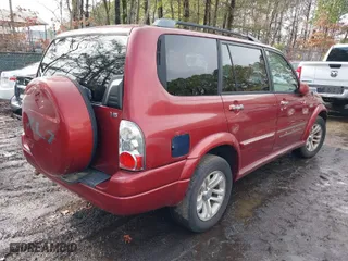 2005 Suzuki XL-7 LX with VIN JS3TY92V054103715, listed as a IAAI auction lot 41467312 with 162,687 mi miles. Bid and sale history available at carsss.com. Image 4.