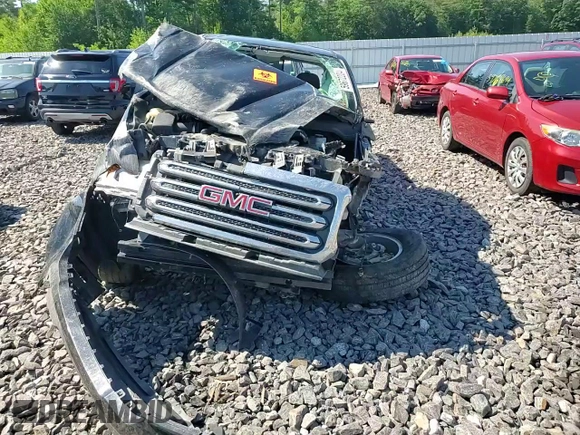 2015 GMC Canyon 2WD SLE z VIN 1GTH5BEA5F1190091, wystawiony jako Copart lot #59672204 z przebiegiem Nie podano mil oraz Szkoda całkowita • Salvage title. Historia ofert i sprzedaży dostępna na DreamBid. Obrazek 11.