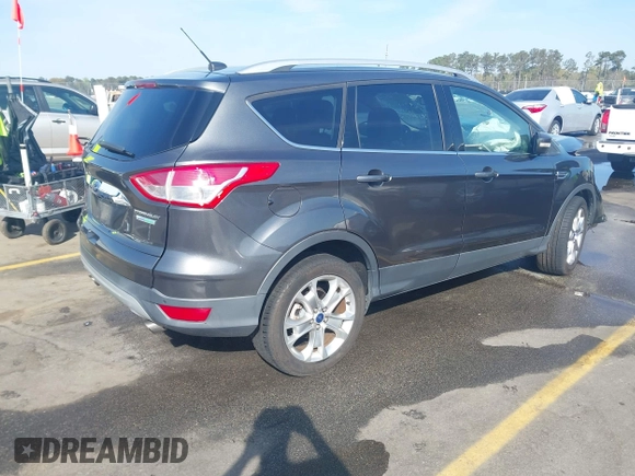 2015 Ford Escape Titanium with VIN 1FMCU0JX1FUB92412, listed as a IAAI auction lot 41893933 with 95,306 mi miles. Bid and sale history available at carsss.com. Image 4.