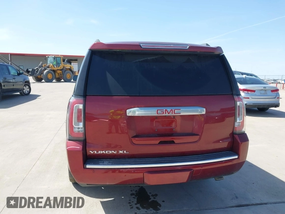 2020 GMC Yukon XL Denali with VIN 1GKS1HKJ3LR238701, listed as a IAAI auction lot 41724274 with 107,323 mi miles and . Bid and sale history available at DreamBid. Image 16.
