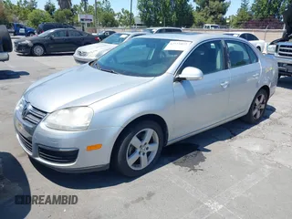 2009 Volkswagen Jetta SE with VIN 3VWRZ71KX9M039028, listed as a IAAI auction lot 42571072 with 112,389 mi miles and . Bid and sale history available at DreamBid. Image 2.