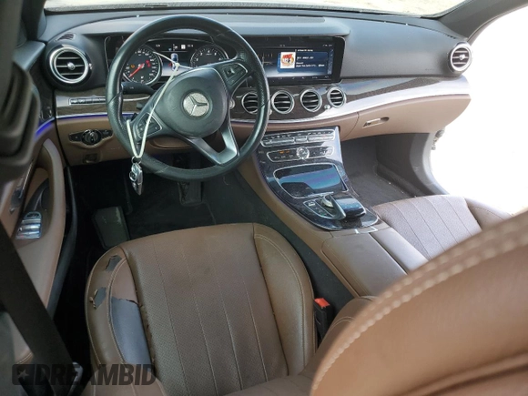 2017 Mercedes-Benz E 300 Luxury with VIN WDDZF4KBXHA063551, listed as a Copart auction lot 84860314 with 134,067 mi miles and Salvage title. Bid and sale history available at DreamBid. Image 8.