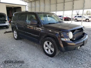 2014 Jeep Patriot High Altitude with VIN 1C4NJPFA2ED624667, listed as a Copart auction lot 52130375 with 198,806 mi miles and Salvage Title. Bid and sale history available at carsss.com. Image 4.