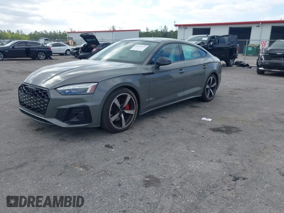 2023 Audi A5 Sportback S line Premium Plus z VIN WAUFACF56PA038023, wystawiony jako IAAI lot #42074137 z przebiegiem 15 998 mil mil oraz . Historia ofert i sprzedaży dostępna na DreamBid. Obrazek 17.