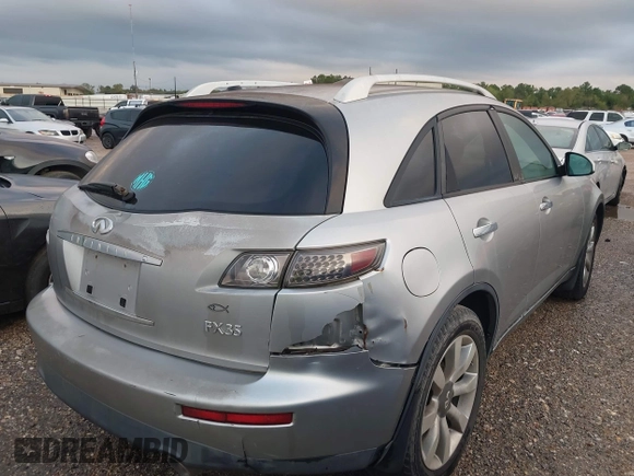 2005 Infiniti FX z VIN JNRAS08W25X207463, wystawiony jako IAAI lot #40895336 z przebiegiem Nie podano mil oraz . Historia ofert i sprzedaży dostępna na DreamBid. Obrazek 4.