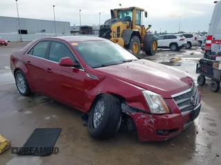 2009 Cadillac CTS RWD z VIN 1G6DV57V690124615, wystawiony jako IAAI lot #42343405 z przebiegiem 173 641 mil mil oraz . Historia ofert i sprzedaży dostępna na DreamBid. Obrazek 1.