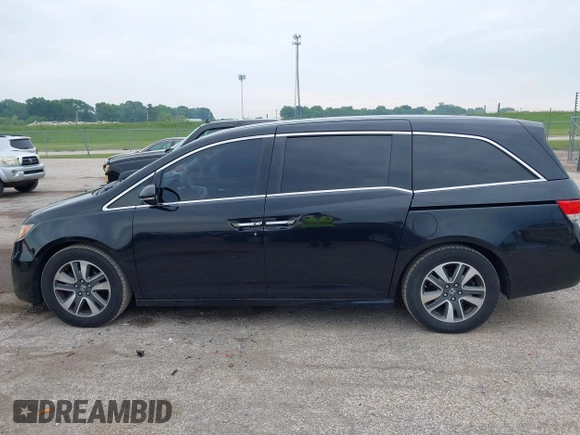 2015 Honda Odyssey Touring Elite with VIN 5FNRL5H97FB124565, listed as a IAAI auction lot 42358412 with 206,444 mi miles and . Bid and sale history available at DreamBid. Image 15.
