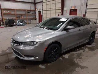 2015 Chrysler 200 Limited with VIN 1C3CCCAB2FN698701, listed as a IAAI auction lot 42073888 with 112,266 mi miles and . Bid and sale history available at DreamBid. Image 2.