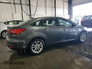 2017 Ford Focus SE with VIN 1FADP3F21HL205754, listed as a Copart auction lot 67166984 with 83,617 mi miles and Salvage title. Bid and sale history available at DreamBid. Image 3.