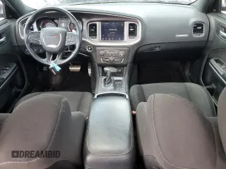 2021 Dodge Charger R/T with VIN 2C3CDXCT7MH613111, listed as a Copart auction lot 56367725 with 77,374 mi miles and Salvage title. Bid and sale history available at DreamBid. Image 8.