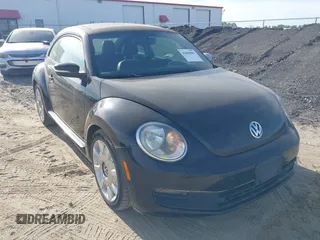 2013 Volkswagen Beetle 2.5L with VIN 3VWJP7AT1DM608370, listed as a IAAI auction lot 42088900 with Not Provided miles and . Bid and sale history available at DreamBid. Image 19.