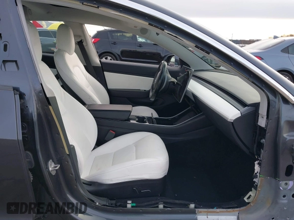 2018 Tesla Model 3 Long Range Battery with VIN 5YJ3E1EB9JF097118, listed as a IAAI auction lot 41619510 with 64,132 mi miles and . Bid and sale history available at DreamBid. Image 5.