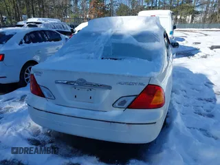 2001 Toyota Avalon XL z VIN 4T1BF28B31U159772, wystawiony jako IAAI lot #41622587 z przebiegiem 175 456 mil mil oraz . Historia ofert i sprzedaży dostępna na DreamBid. Obrazek 16.