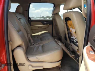 2012 Chevrolet Suburban LT с VIN 1GNSCJE06CR320459, выставлен на аукционе Copart как лот 62087665 с пробегом 318 964 миль миль и Списание • Salvage title. История ставок и продаж доступна на DreamBid. Изображение 11.