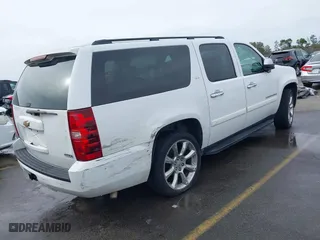 2008 Chevrolet Suburban LTZ with VIN 1GNFC16018R143195, listed as a IAAI auction lot 41577367 with 223,506 mi miles. Bid and sale history available at carsss.com. Image 4.