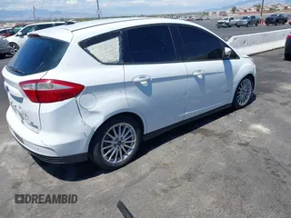 2013 Ford C-Max SE with VIN 1FADP5AU9DL556619, listed as a IAAI auction lot 42140929 with 254,722 mi miles. Bid and sale history available at carsss.com. Image 4.