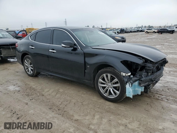2018 Infiniti Q70 Luxe with VIN JN1BY1ARXJM220246, listed as a Copart auction lot 43276115 with 133,292 mi miles and Salvage title. Bid and sale history available at DreamBid. Image 4.