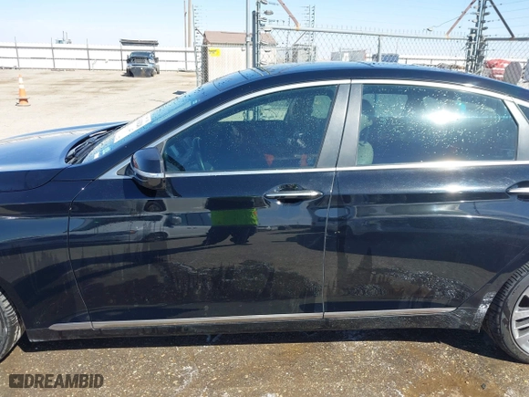2015 Hyundai Genesis 5.0L with VIN KMHGN4JF5FU027850, listed as a IAAI auction lot 41634248 with 122,999 mi miles. Bid and sale history available at carsss.com. Image 15.