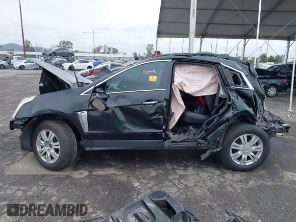 2015 Cadillac SRX with VIN 3GYFNAE36FS573940, listed as a IAAI auction lot 41808779 with Not Provided miles and . Bid and sale history available at DreamBid. Image 13.