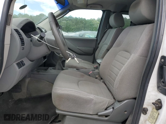2006 Nissan Frontier XE with VIN 1N6BD06T56C432179, listed as a Copart auction lot 60276515 with 156,567 mi miles and Salvage title. Bid and sale history available at DreamBid. Image 7.