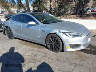 2017 Tesla Model S 100D with VIN 5YJSA1E21HF199515, listed as a IAAI auction lot 41341244 with 113,661 mi miles. Bid and sale history available at carsss.com. Image 1.