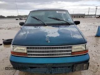 1994 Plymouth Voyager z VIN 2P4GH2530RR635286, wystawiony jako Copart lot #80988944 z przebiegiem 175 646 mil mil oraz Szkody całkowita. Historia ofert i sprzedaży dostępna na DreamBid. Obrazek 5.