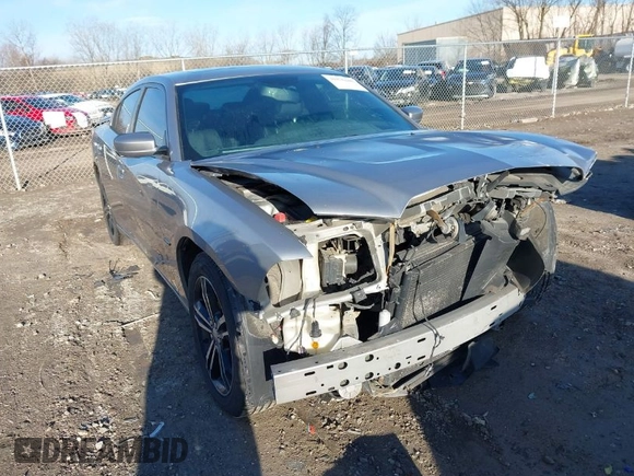 2014 Dodge Charger RT Plus with VIN 2C3CDXDT1EH124140, listed as a IAAI auction lot 41876248 with 127,399 mi miles. Bid and sale history available at carsss.com. Image 1.