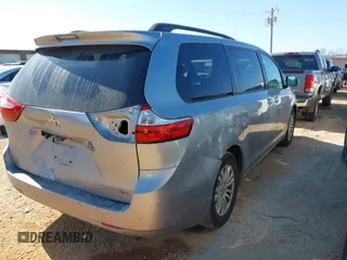 2016 Toyota Sienna XLE with VIN 5TDYK3DC4GS739785, listed as a IAAI auction lot 41513038 with 71,935 mi miles. Bid and sale history available at carsss.com. Image 4.