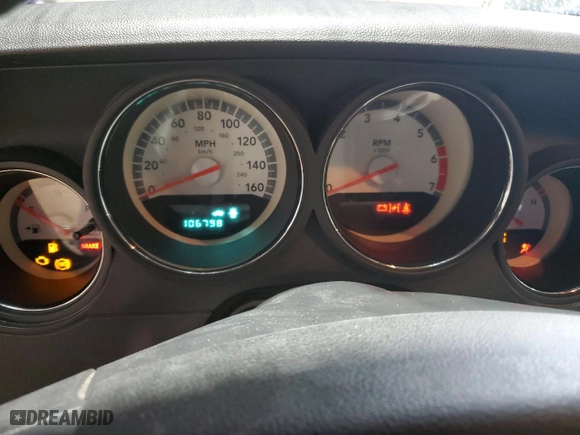 2010 Dodge Challenger R/T with VIN 2B3CJ5DTXAH173115, listed as a Copart auction lot 49111015 with 106,798 mi miles and Salvage Title. Bid and sale history available at carsss.com. Image 9.
