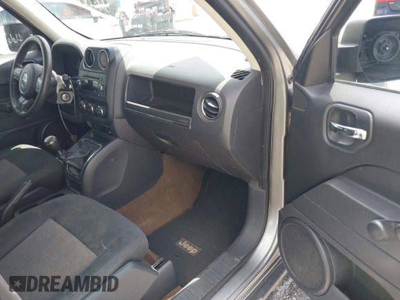 2014 Jeep Patriot Sport with VIN 1C4NJPBA5ED559951, listed as a IAAI auction lot 42802286 with 171,487 mi miles and . Bid and sale history available at DreamBid. Image 5.
