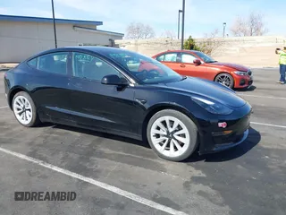 2022 Tesla Model 3 Long Range with VIN 5YJ3E1EB1NF133356, listed as a IAAI auction lot 41568303 with 73,406 mi miles and . Bid and sale history available at DreamBid. Image 12.