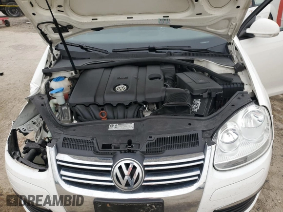 2010 Volkswagen Jetta SEL z VIN 3VWRX7AJ8AM115699, wystawiony jako Copart lot #61933765 z przebiegiem Nie podano mil oraz Szkoda całkowita • Salvage title. Historia ofert i sprzedaży dostępna na DreamBid. Obrazek 11.