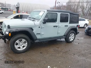 2023 Jeep Wrangler Sport S with VIN 1C4HJXDN5PW609316, listed as a IAAI auction lot 40960863 with 15,614 mi miles and . Bid and sale history available at DreamBid. Image 2.