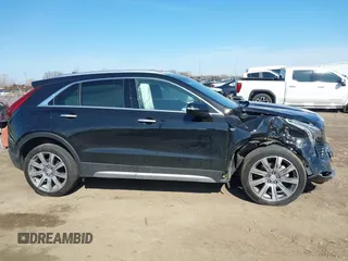 2023 Cadillac XT4 AWD Premium Luxury with VIN 1GYFZDR46PF195391, listed as a IAAI auction lot 41848429 with 31,904 mi miles and . Bid and sale history available at carsss.com. Image 13.