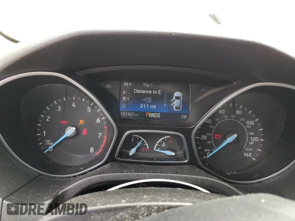 2015 Ford Focus SE z VIN 1FADP3F24FL357329, wystawiony jako Copart lot #59976215 z przebiegiem 182 407 mil mil oraz Czysty tytuł • Clean title. Historia ofert i sprzedaży dostępna na DreamBid. Obrazek 9.