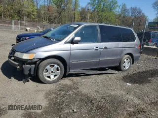 1999 Honda Odyssey EX z VIN 2HKRL1867XH508167, wystawiony jako Copart lot #53609945 z przebiegiem Nie podano mil oraz Szkoda całkowita • Salvage title. Historia ofert i sprzedaży dostępna na DreamBid. Obrazek 1.