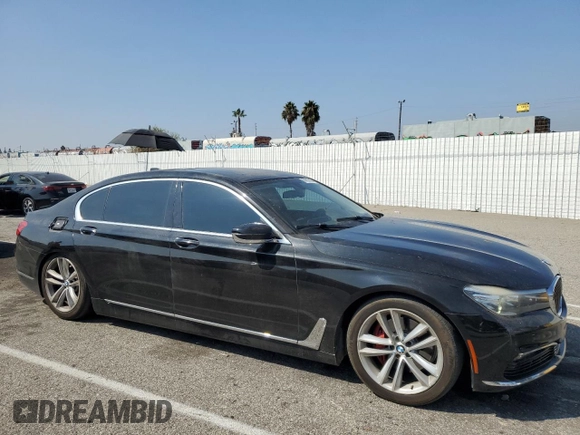 2016 BMW 7 Series 740i with VIN WBA7E2C59GG547804, listed as a Copart auction lot 68620463 with 122,937 mi miles. Bid and sale history available at carsss.com. Image 4.