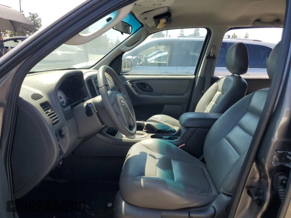 2005 Ford Escape XLT z VIN 1FMYU03155KB11291, wystawiony jako Copart lot #52246495 z przebiegiem Nie podano mil oraz Szkoda całkowita • Salvage title. Historia ofert i sprzedaży dostępna na DreamBid. Obrazek 7.