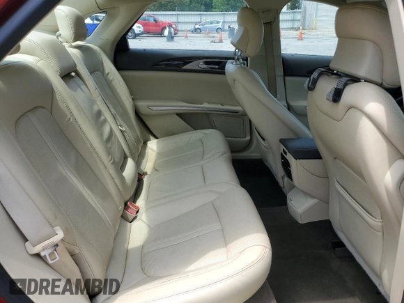 2014 Lincoln MKZ z VIN 3LN6L2GK4ER825465, wystawiony jako Copart lot #55911345 z przebiegiem 78 783 mil mil oraz Szkoda całkowita • Salvage title. Historia ofert i sprzedaży dostępna na DreamBid. Obrazek 10.