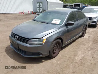 2014 Volkswagen Jetta Sedan S with VIN 3VW1K7AJ2EM371905, listed as a IAAI auction lot 42068276 with 198,419 mi miles. Bid and sale history available at carsss.com. Image 2.