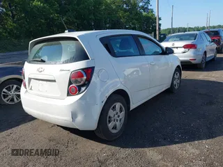 2015 Chevrolet Sonic LS with VIN 1G1JA6SG8F4131976, listed as a IAAI auction lot 42552157 with 99,575 mi miles and . Bid and sale history available at DreamBid. Image 4.